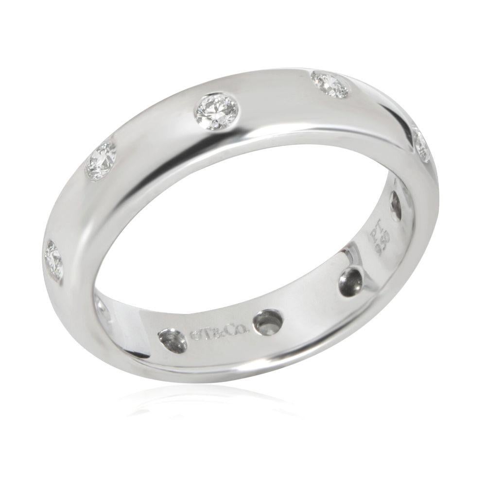 TIFFANY & Co. Etoile Platinum Diamond 4mm Band Ring 4.5

 Metal: Platinum
 Size: 4.5 
 Band Width: 4mm
 Weight: 6.60 grams 
 Diamond: 10 round brilliant diamonds, carat total weight .22
 Hallmark: ©T&Co. PT950
 Condition: Excellent condition
