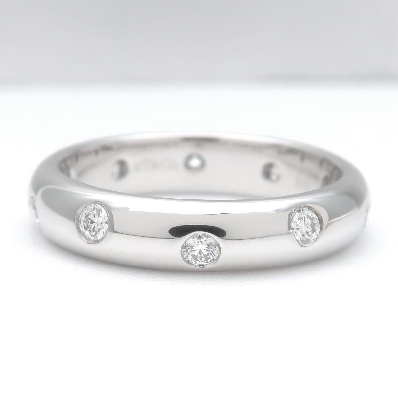 TIFFANY & Co. Etoile Platinum Diamond 4mm Band Ring 5

 Metal: Platinum
 Size: 5 
 Band Width: 4mm
 Weight: 6.10 grams 
 Diamond: 10 round brilliant diamonds, carat total weight .22
 Hallmark: ©T&Co. PT950
 Condition: Excellent condition, like new
