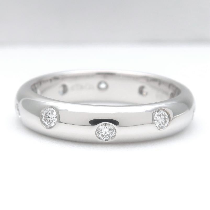 TIFFANY & Co. Etoile Platinum Diamond 4mm Band Ring 5

 Metal: Platinum
 Size: 5 
 Band Width: 4mm
 Weight: 6.70 grams 
 Diamond: 10 round brilliant diamonds, carat total weight .22
 Hallmark: ©T&Co. PT950
 Condition: Excellent condition
 Value: