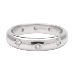 TIFFANY 
Co. Etoile, bague à anneau de 4 mm en platine et diamants 5,5