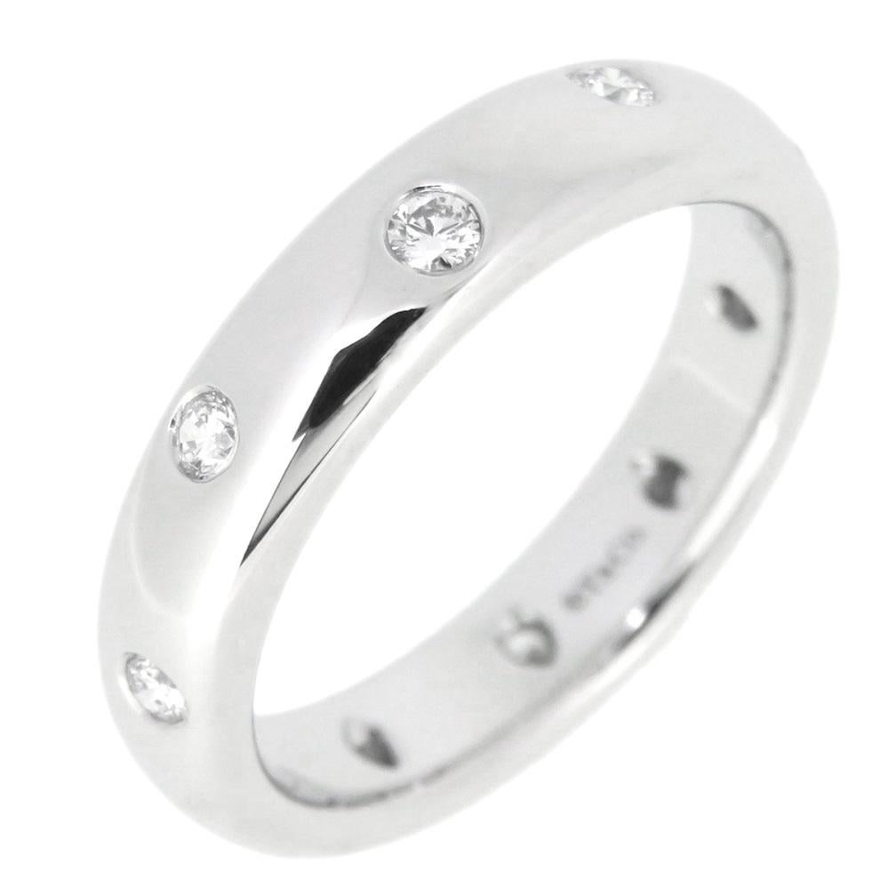 TIFFANY & Co. Etoile Platinum Diamond 4mm Band Ring 5.5 

Metal: Platinum
Size: 5.5
Band Width: 4mm
Weight: 8.0 grams 
Diamond: 10 round brilliant diamonds, carat total weight .22
Hallmark: ©T&Co. PT950
Condition: Brand new, never worn, comes with