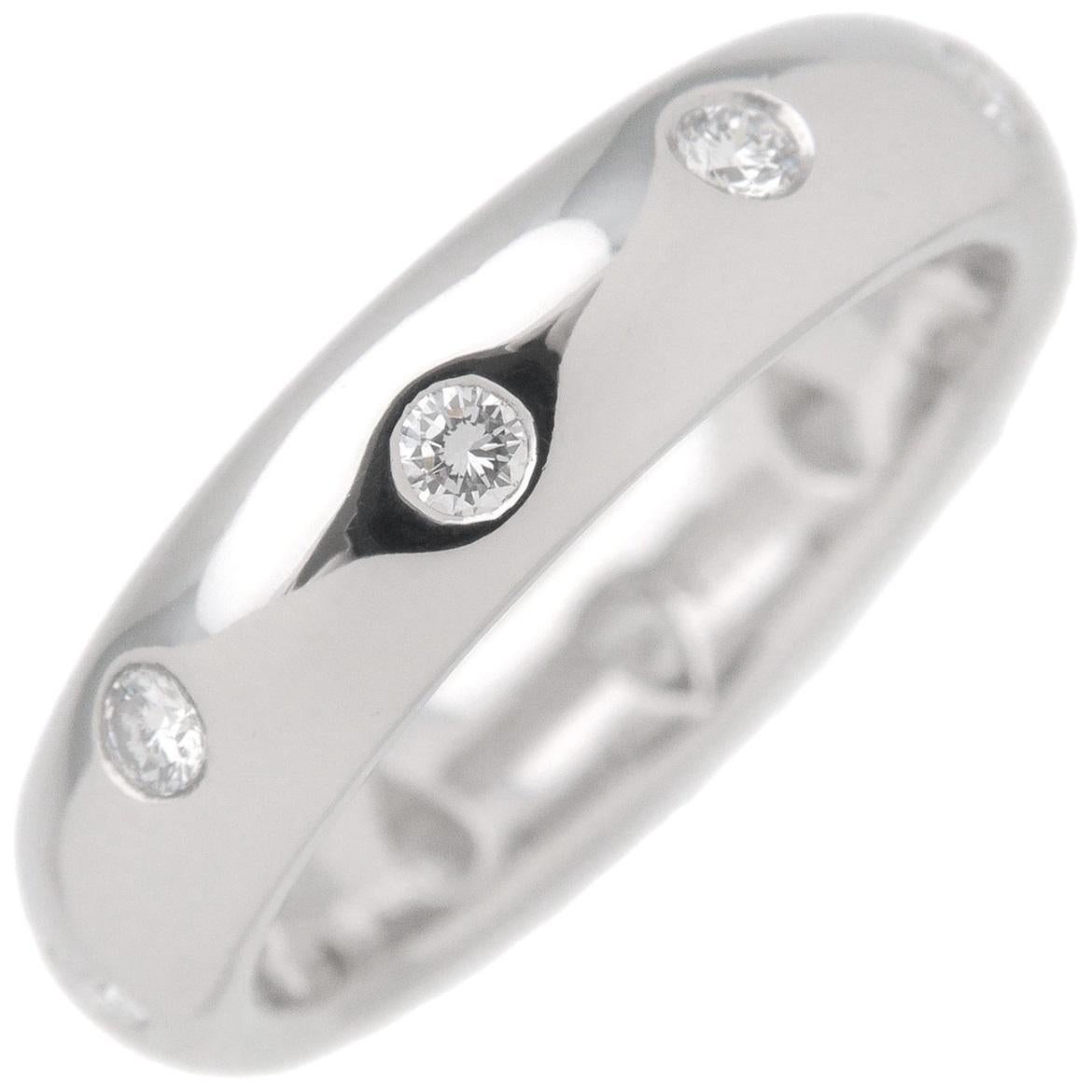TIFFANY & Co. Etoile Platinum Diamond 4mm Band Ring 6

 Metal: Platinum
 Size: 6 
 Band Width: 4mm
 Weight: 7.30 grams 
 Diamond: 10 round brilliant diamonds, carat total weight .22
 Hallmark: TIFFANY&Co. PT950
 Condition: Excellent condition, like