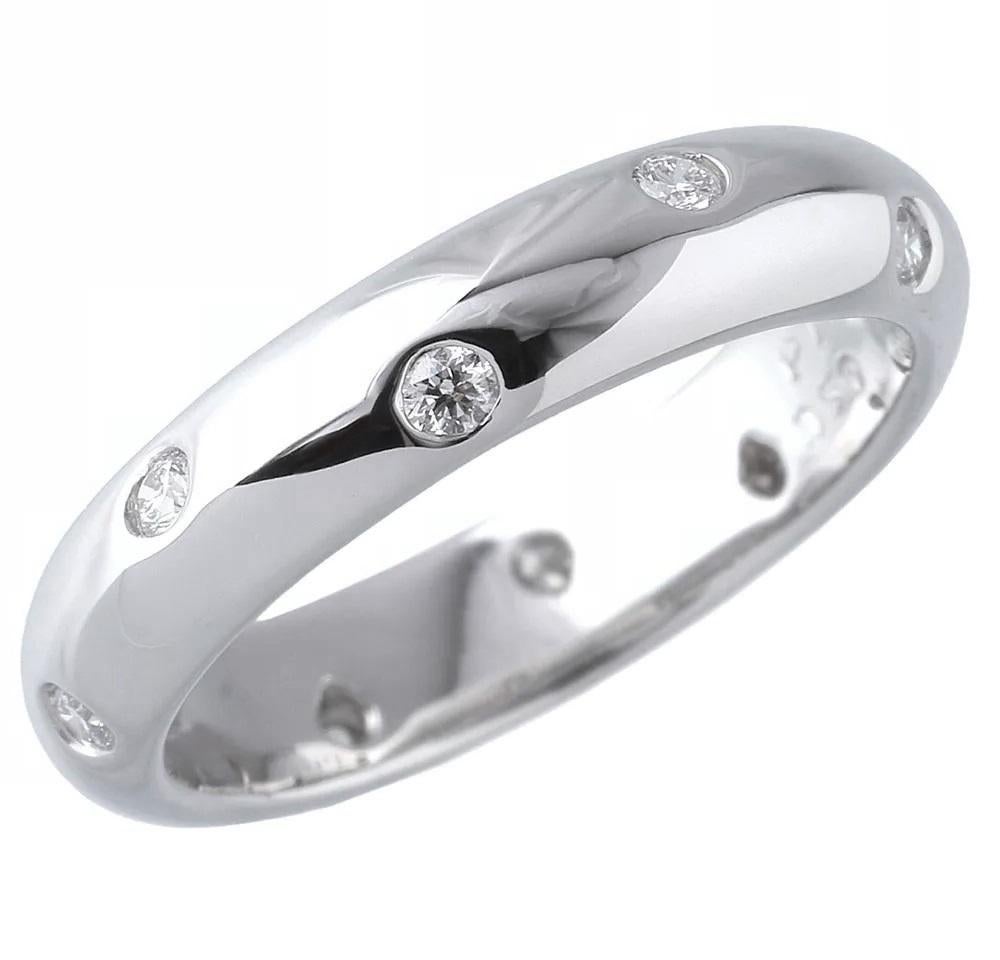 TIFFANY & Co. Etoile Platinum Diamond 4mm Band Ring 6.5

 Metal: Platinum
 Size: 6.5 
 Band Width: 4mm
 Weight: 7.70 grams 
 Diamond: 10 round brilliant diamonds, carat total weight .22
 Hallmark: T&Co. PT950
 Condition: Excellent condition, like