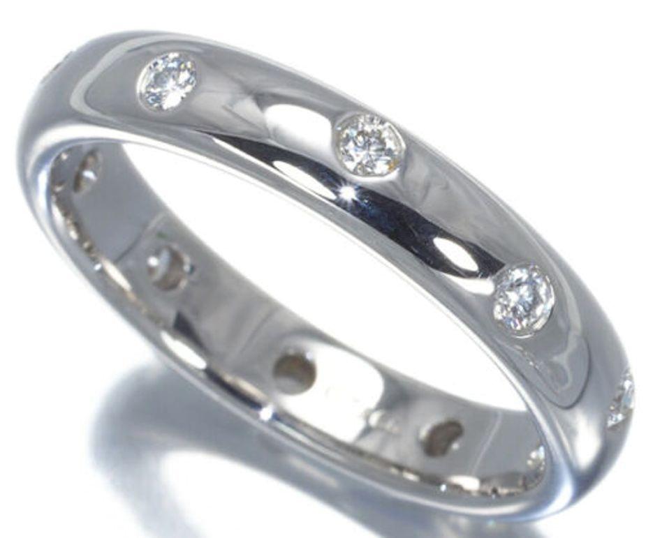 TIFFANY & Co. Etoile Platinum Diamond 4mm Band Ring 7.5

 Metal: Platinum
 Size: 7.5 
 Band Width: 4mm
 Weight: 7.70 grams 
 Diamond: 10 round brilliant diamonds, carat total weight .22
 Hallmark: ©T&Co. PT950
 Condition: Excellent condition, comes