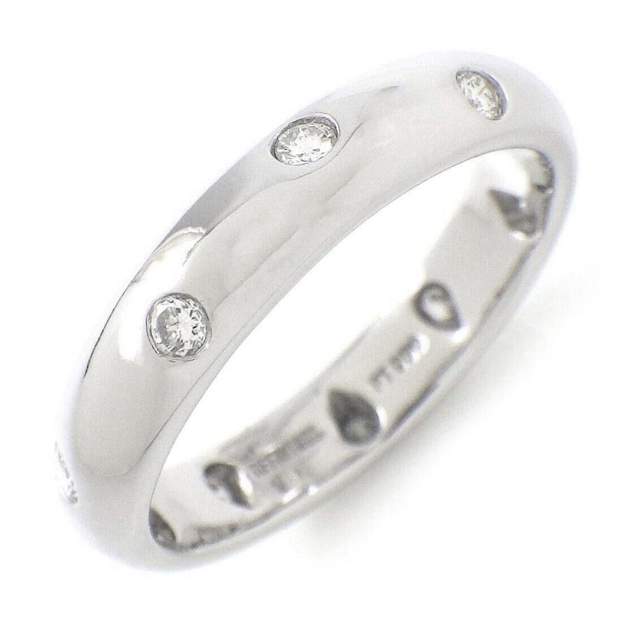 TIFFANY & Co. Etoile Platin-Diamant-Ring mit 4 mm Bandring 8

 Metall: Platin
 Größe: 8 
 Bandbreite: 4mm
 Gewicht: 7,90 Gramm 
 Diamant: 10 runde Brillanten, Gesamtgewicht 0,22 Karat
 Markenzeichen: TIFFANY&CO. PT950
 Zustand: Ausgezeichneter