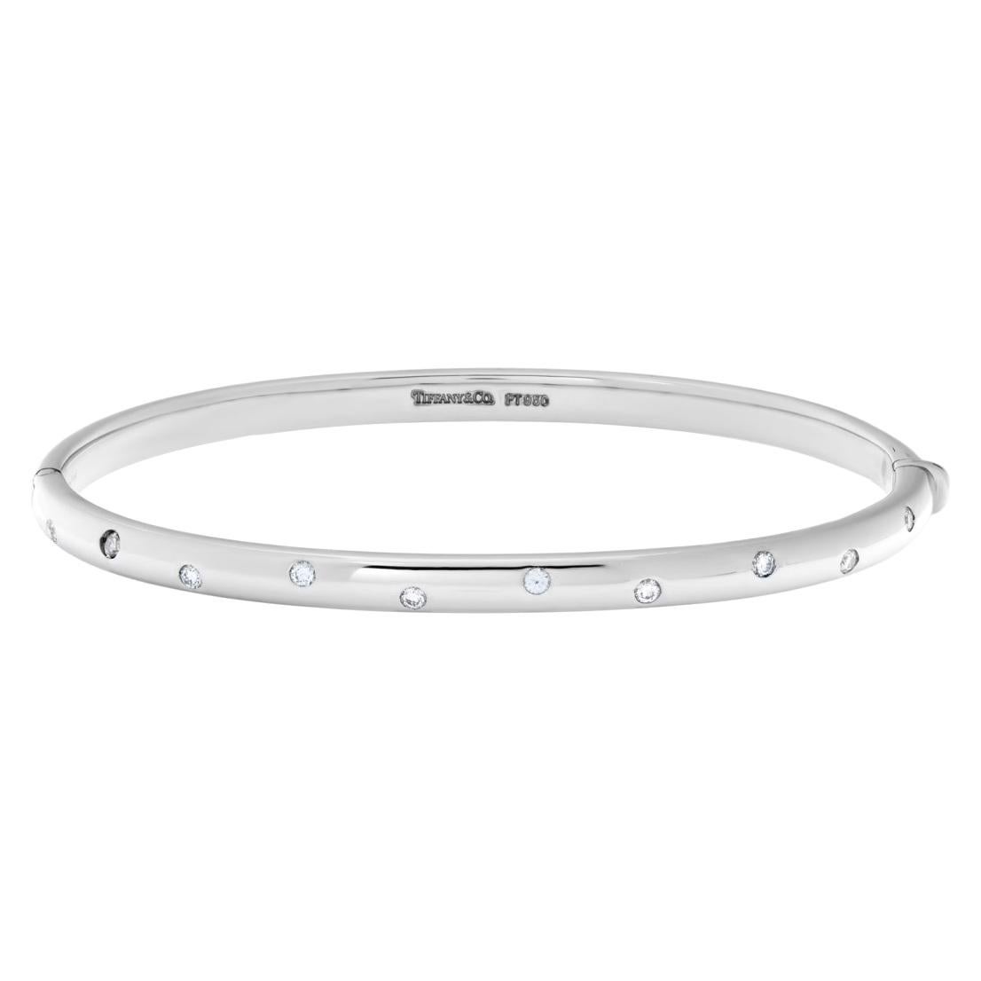 TIFFANY & Co. Bracelet Etoile en platine avec diamants

Métal : Platine
Poids : 36,60 grammes
Circonférence intérieure : 7