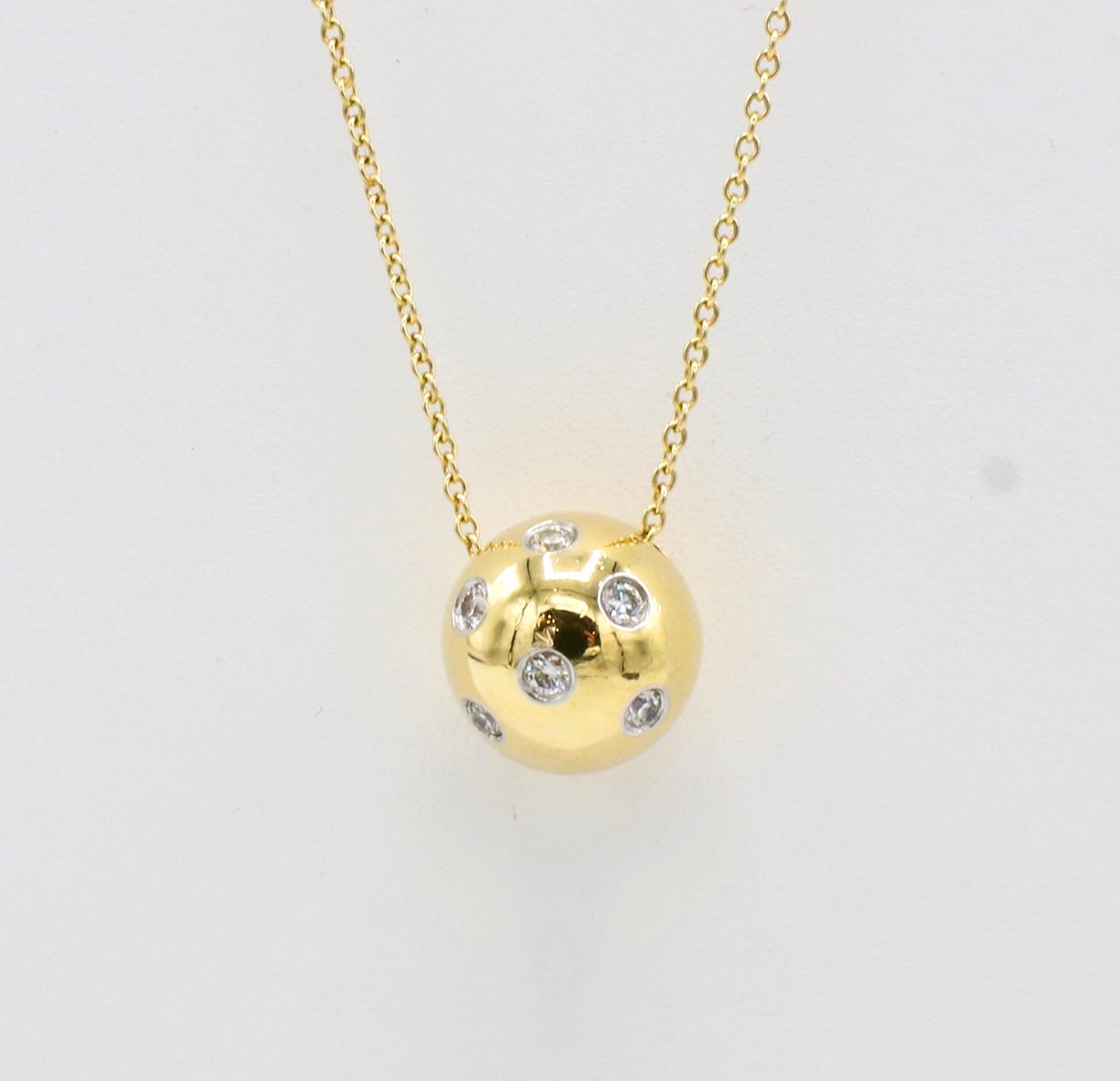 Tiffany & Co. Etoile Platinum & Gold Diamond Ball Drop Pendant Necklace 
Metal: Platinum & 18k yellow gold
Weight: 5.73 grams
Diamonds: Approx. .30 CTW G VS round diamonds
Diameter: 11mm
Chain length: 19 inches
