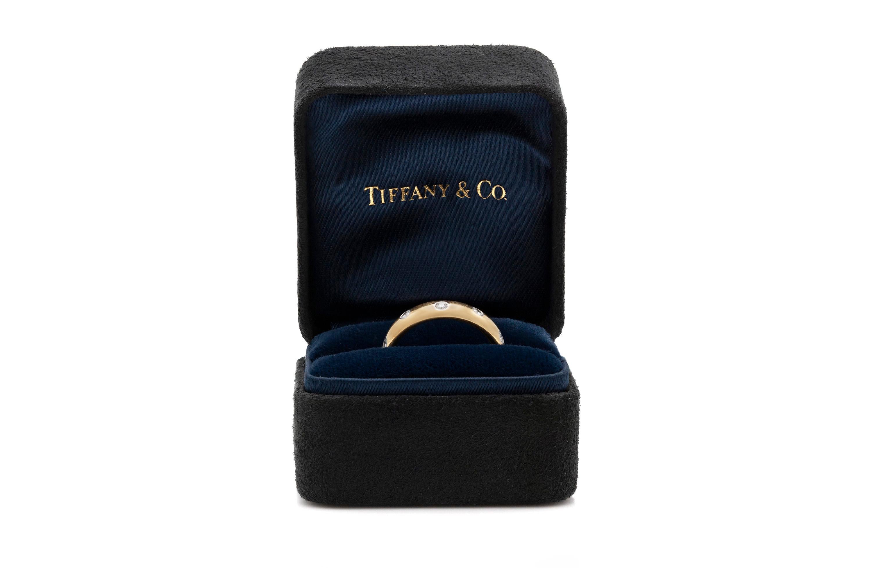 Finely crafted in 18k yellow gold with diamonds. Signed by Tiffany & Co, from the Etoile collection.