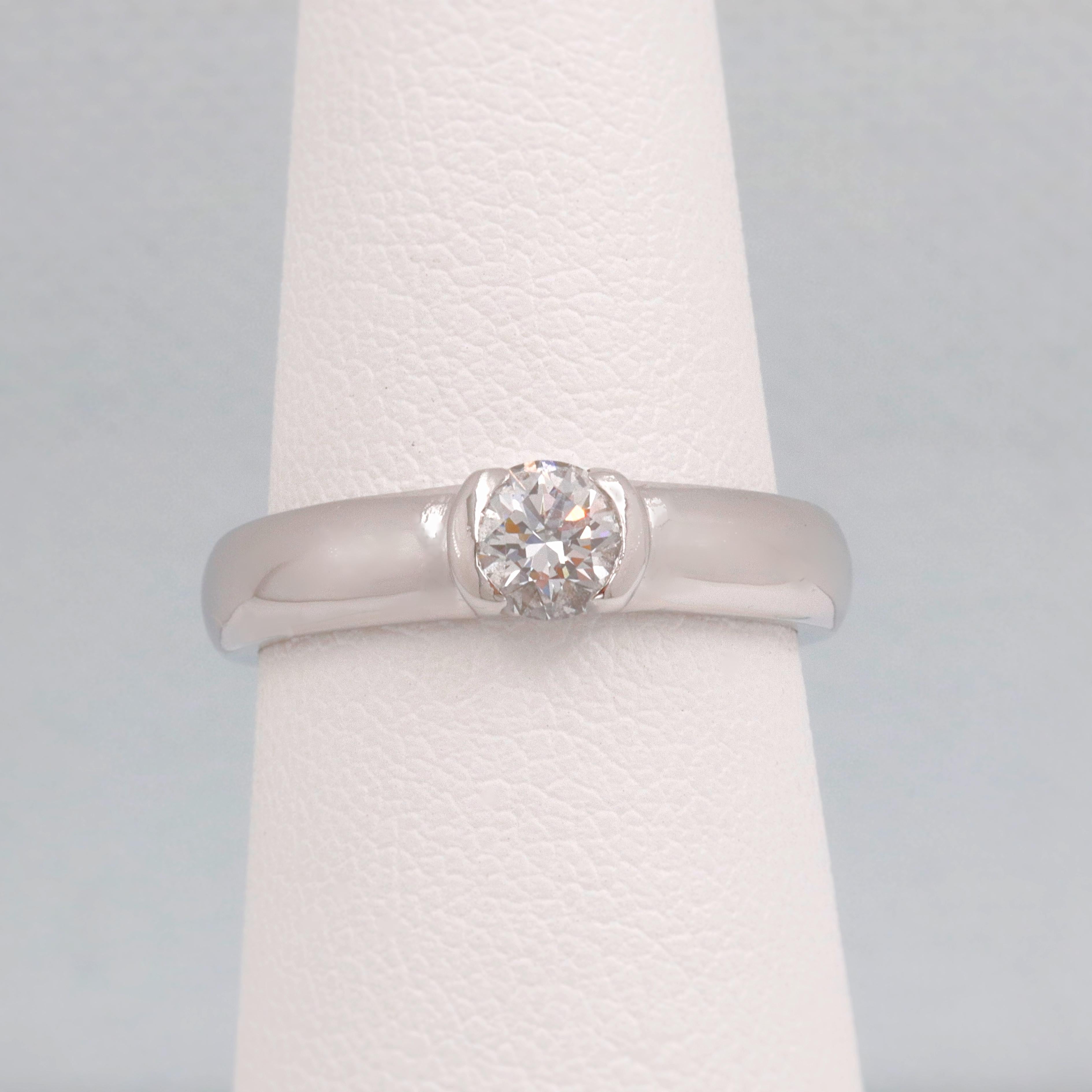 Tiffany & Co.

Style:  ETOILE Diamond Engagement Ring
Serial Number:  D29900
Metal:  Platinum PT950
Size:  6 - sizable
Total Carat Weight:  0.39 CTS
Diamond Shape:  Round Brilliant 0.39 cts
Diamond Color & Clarity:   
Hallmark:  ©TIFFANY&CO. PT950
