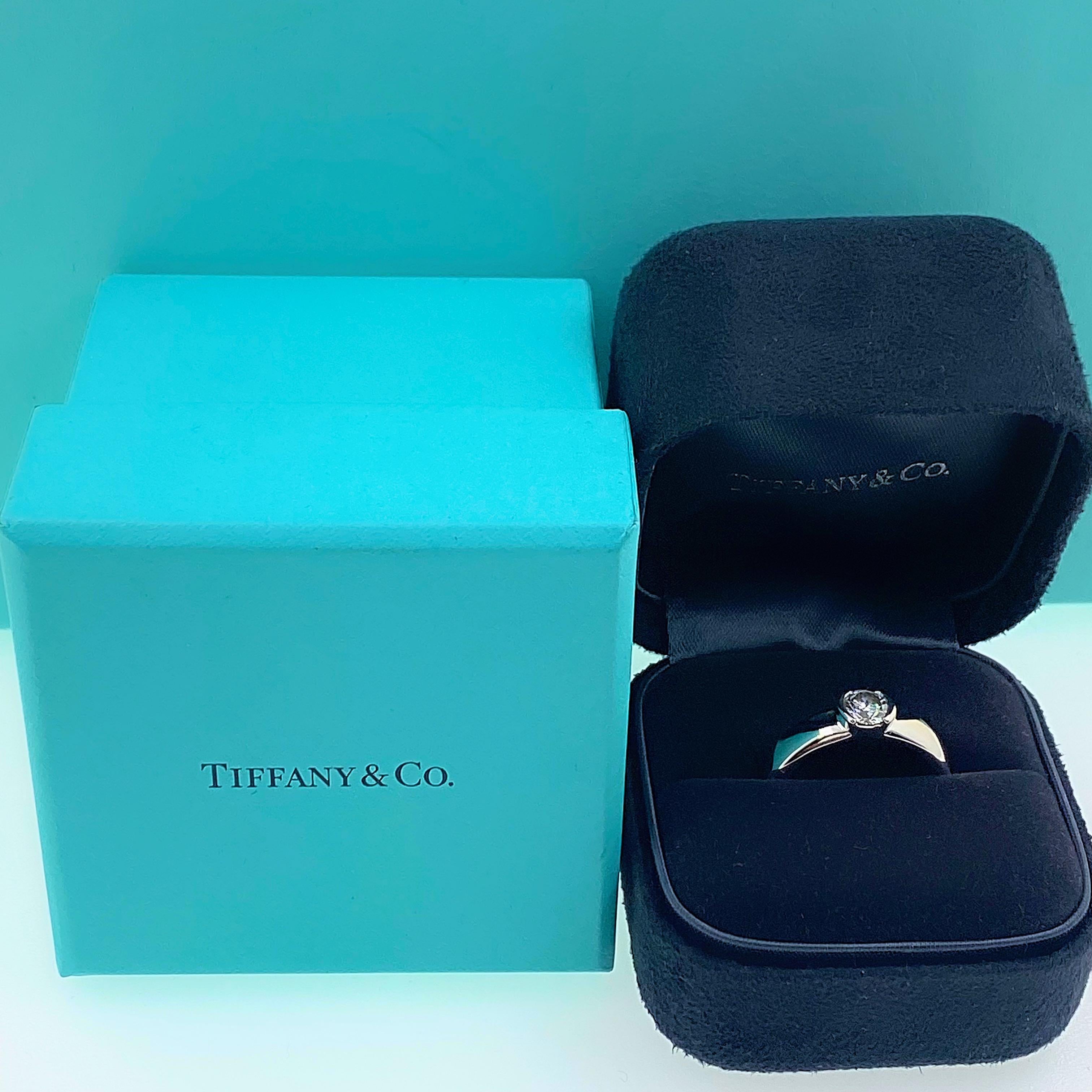 Tiffany & Co. Etoile Diamond Solitaire Engagement Ring
Style:  ETOILE
Ref. number:  27676642
Metal:  PT950 Platinum
Size:  5.75 sizable
TCW:  0.56 cts
Main Diamond:  Round Brilliant Diamond
Color & Clarity:  H, VVS2
Hallmark:  ©TIFFANY&Co. PT950