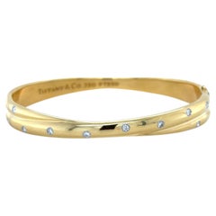 Tiffany & Co. Etoile Yellow Gold, Platinum and Diamond Bangle Bracelet