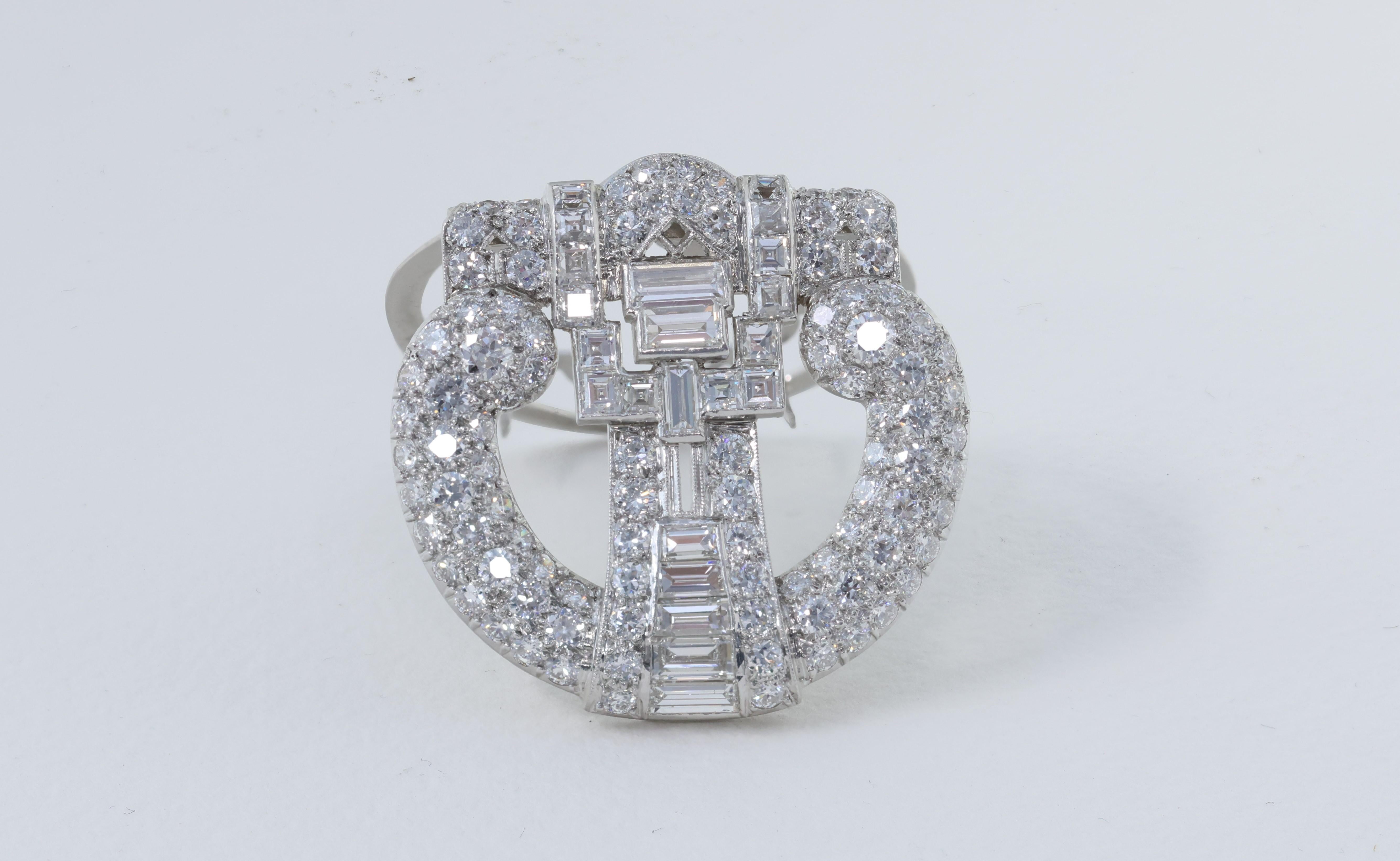 Tiffany & Co. Exceptional Art Deco Platinum and Diamond Clip 5.80 Carats.

Diamonds 
  116 = 5.80 Carats appx. 
  Shape - Old European Cut/ Baguette Cut / Carre Cut
  Colors - D to F
  Clarity - VS2+

Brooch
  Metal - Platinum 
  Weight - 17.73