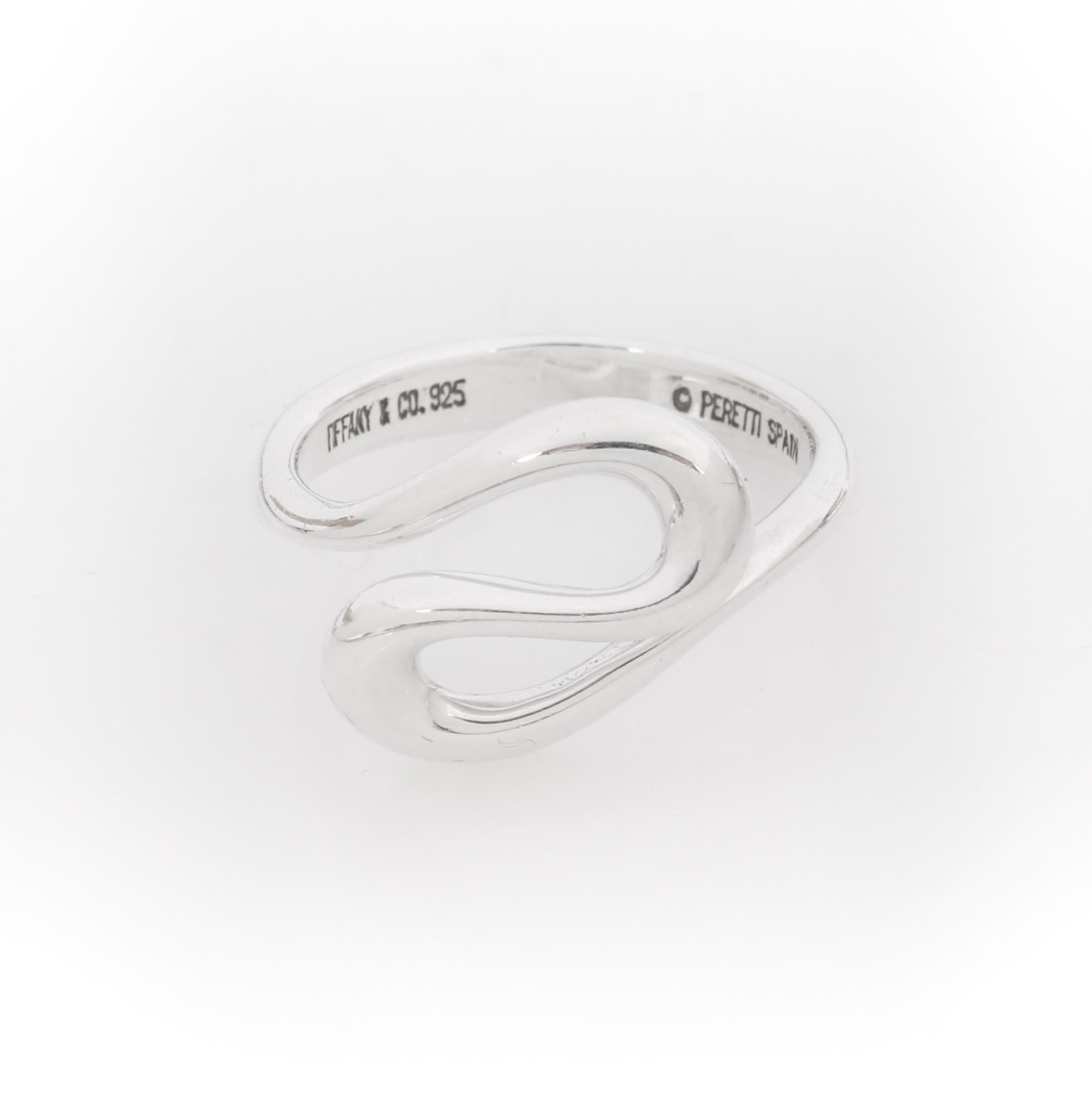TIFFANY & CO F/W 2004 Elsa Peretti “Open Wave” Swirled Sterling Silver Ring 
 
Brand / Manufacturer: Tiffany & Co
Designer: Elsa Peretti 
Collection: F/W 2004 
Style: Ring
Color(s): Silver 
Marked Material: “925” Stirling Silver
Additional Details /