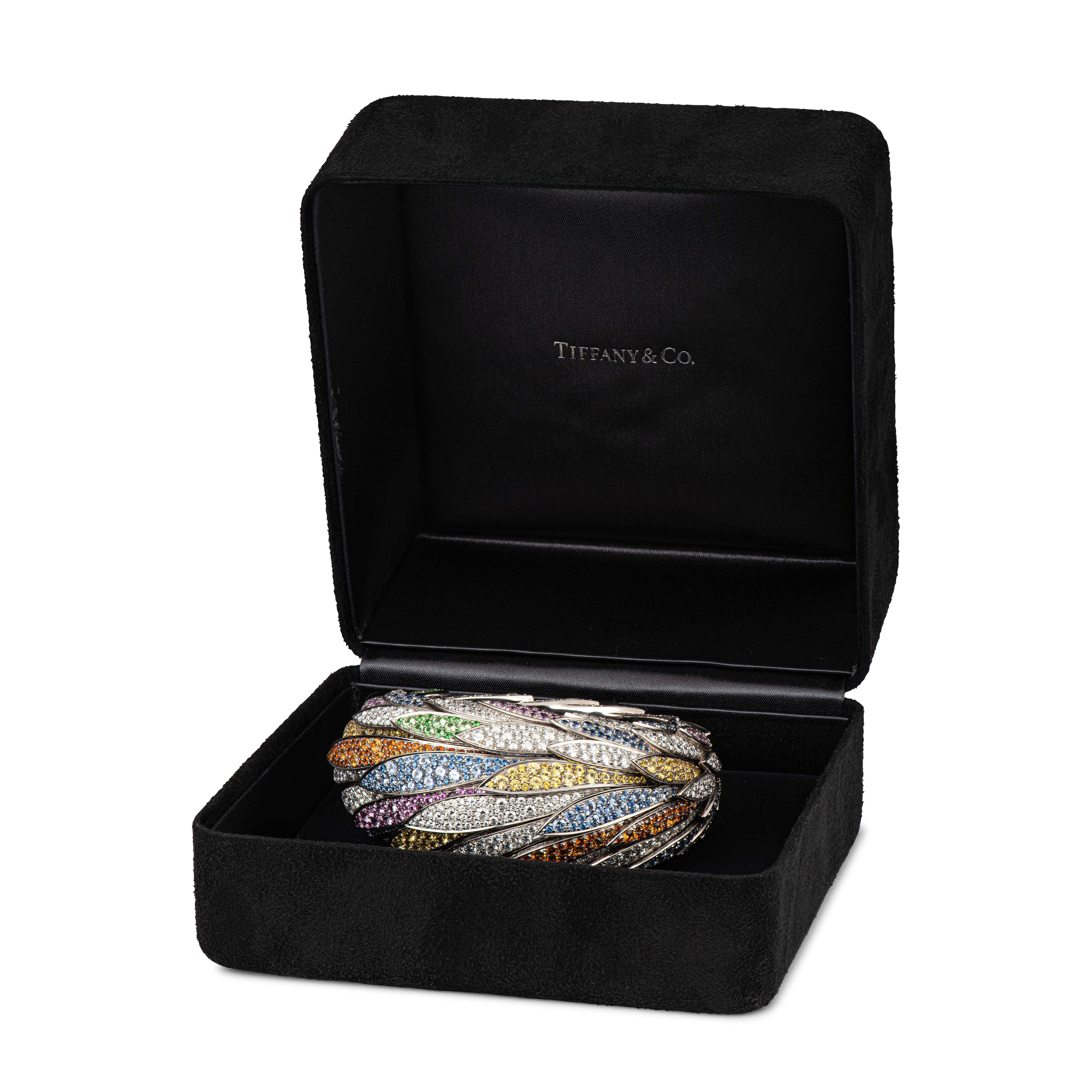 Modern Tiffany & Co. Feathered Cloak Platinum Garnet, Sapphire, Diamond Cuff Bracelet For Sale