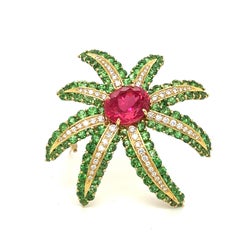 Tiffany & Co. Broche feux d'artifice en tourmaline rose, tsavorite, grenat et diamants 18 carats