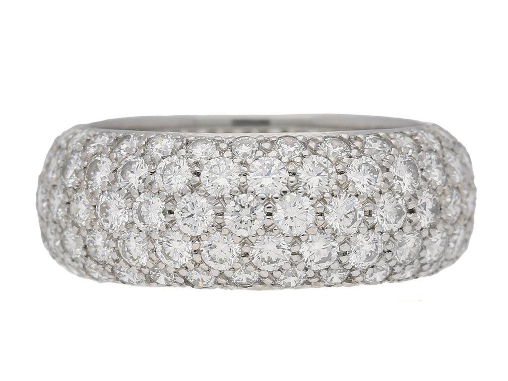 Vintage Tiffany & Co. five row diamond ring. Set with one hundred and forty five round brilliant cut diamonds in open back grain settings with a combined approximate weight of 4.35 carats, to a smoothly conforming bombé shape band, set throughout