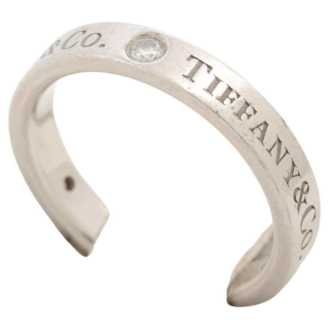 Tiffany & Co. Bague à anneau plat en diamant