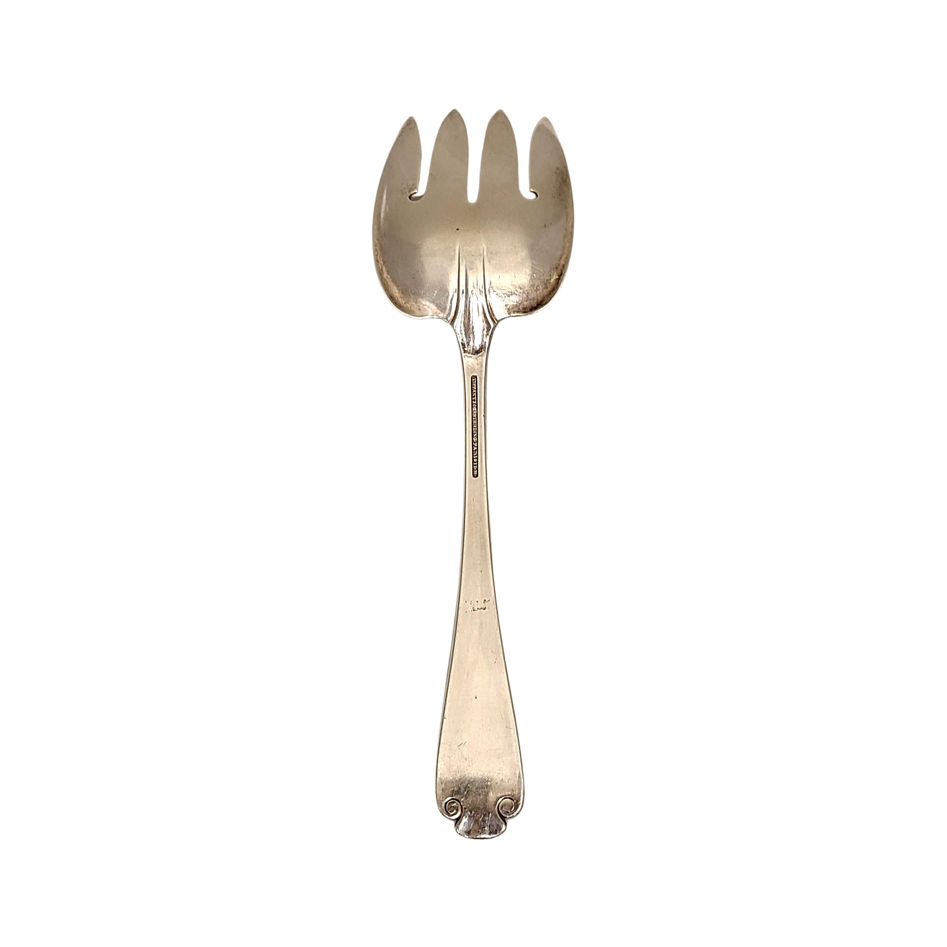 Sterling silver large fish serving fork by Tiffany & Co in the Flemish pattern.

Monogram appears to be LHA

Beautiful heavy serving fork in the Flemish pattern, featuring a simple and elegant scroll design, making it a timeless classic that is