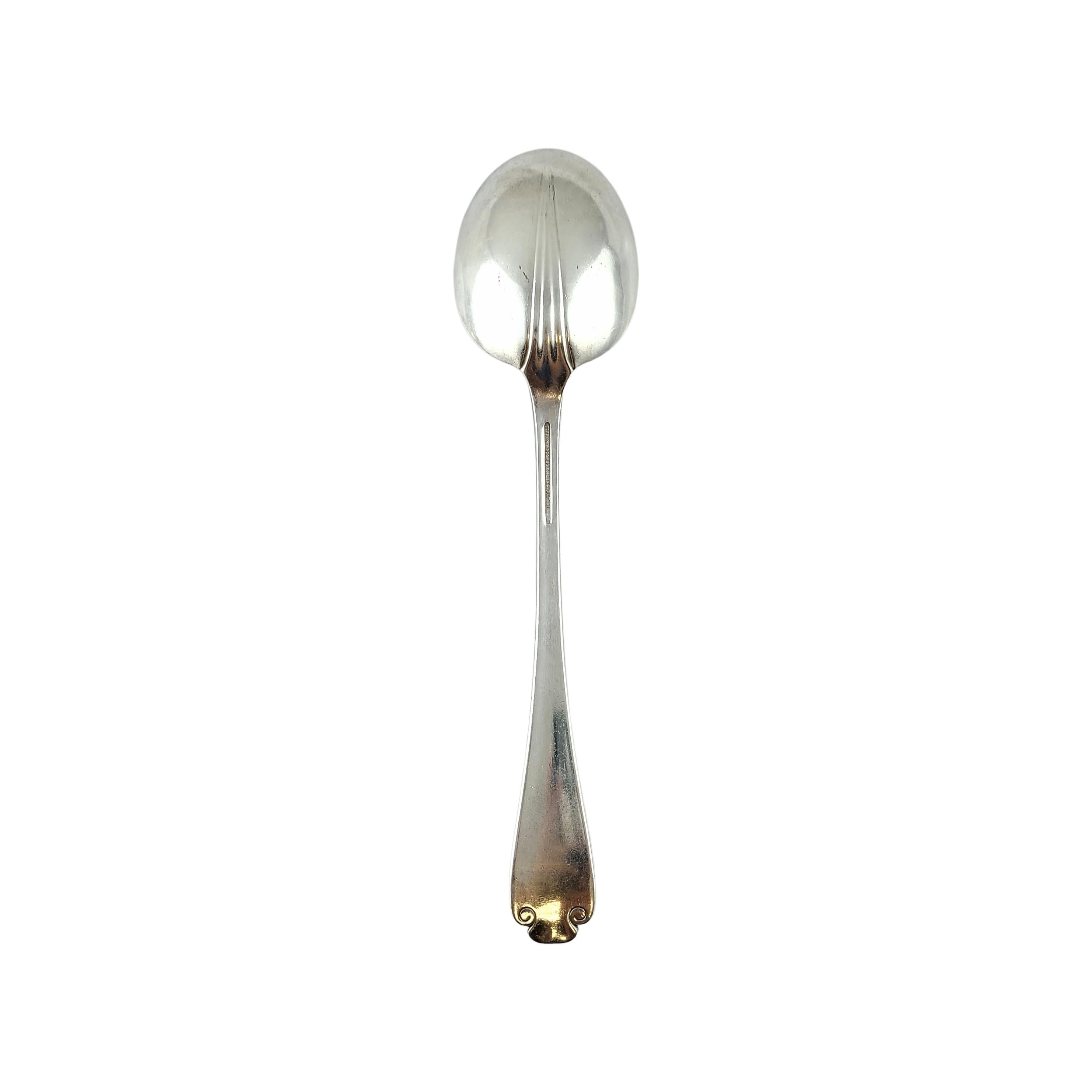 Sterling silver vegetable serving spoon by Tiffany & Co in the Flemish pattern.

Monogram appears to be LHA

Beautiful heavy serving spoon in the Flemish pattern, featuring a simple and elegant scroll design, making it a timeless classic that is