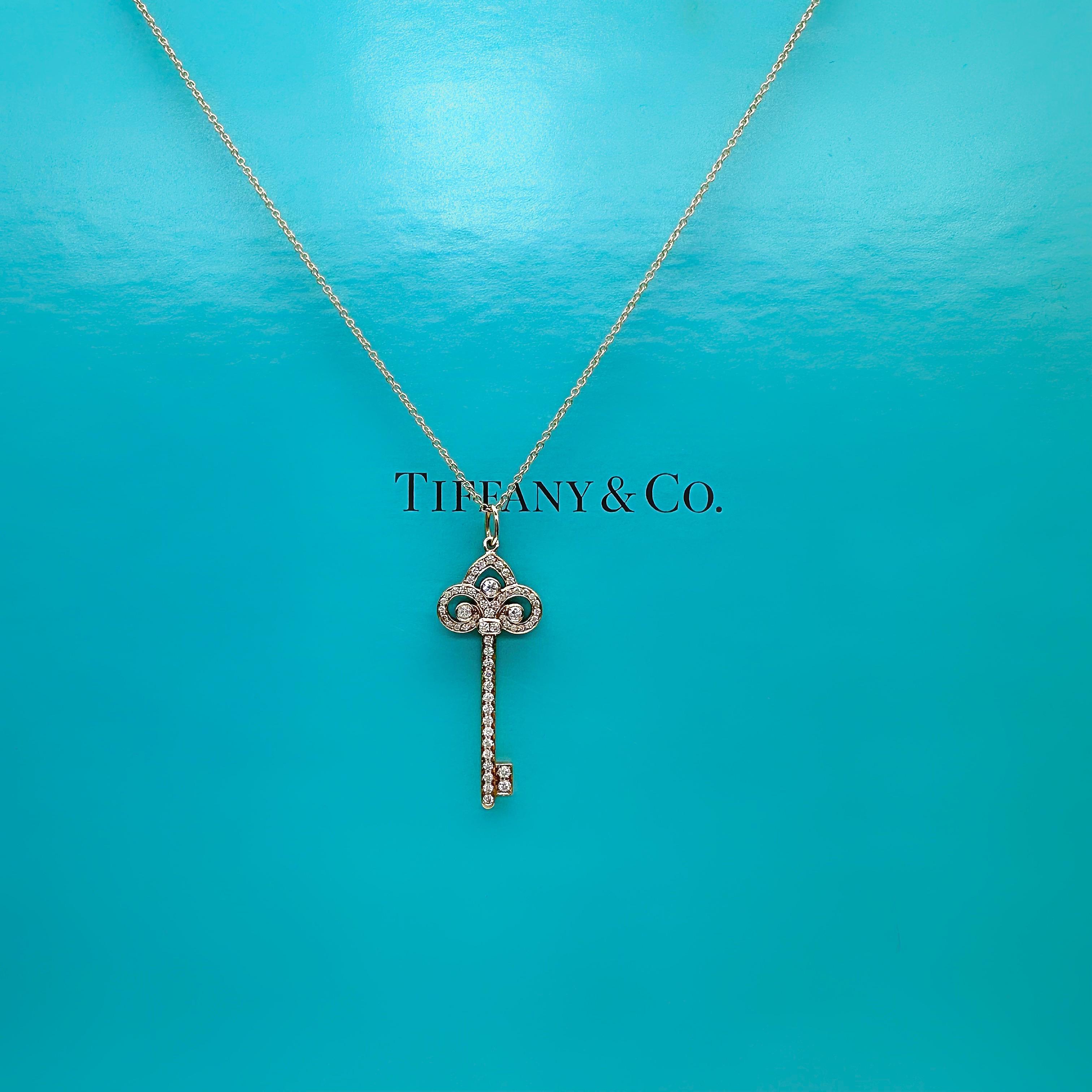 Women's or Men's Tiffany & Co Fleur De Lis Diamond Key Pendant in 18 Karat Rose Gold For Sale