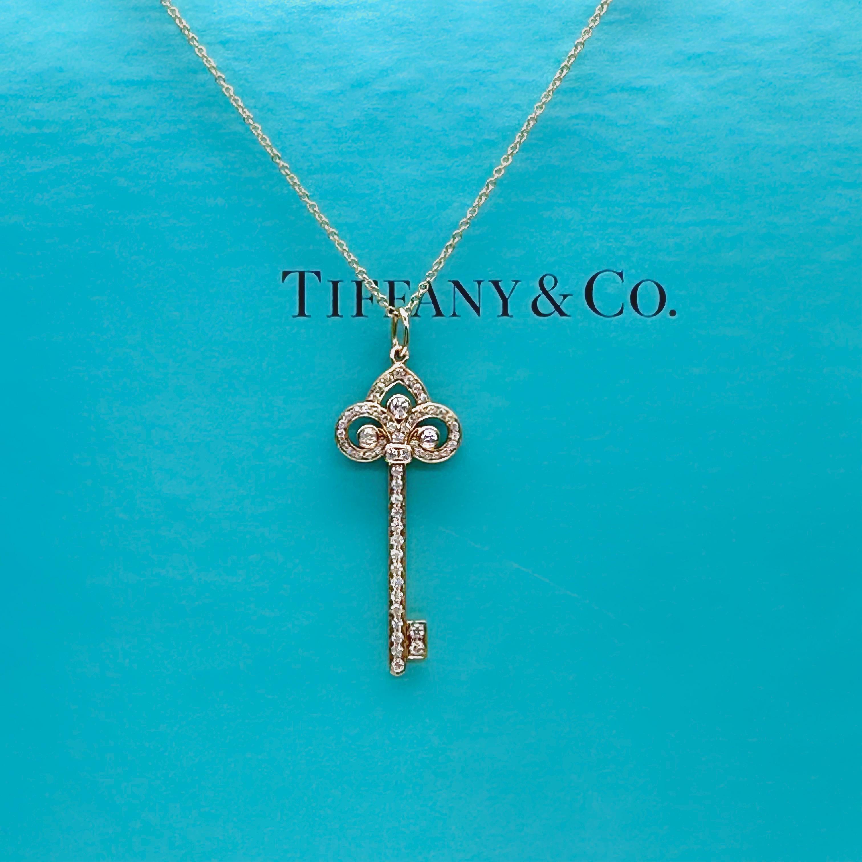 Tiffany & Co Fleur De Lis Diamond Key Pendant in 18 Karat Rose Gold For Sale 1