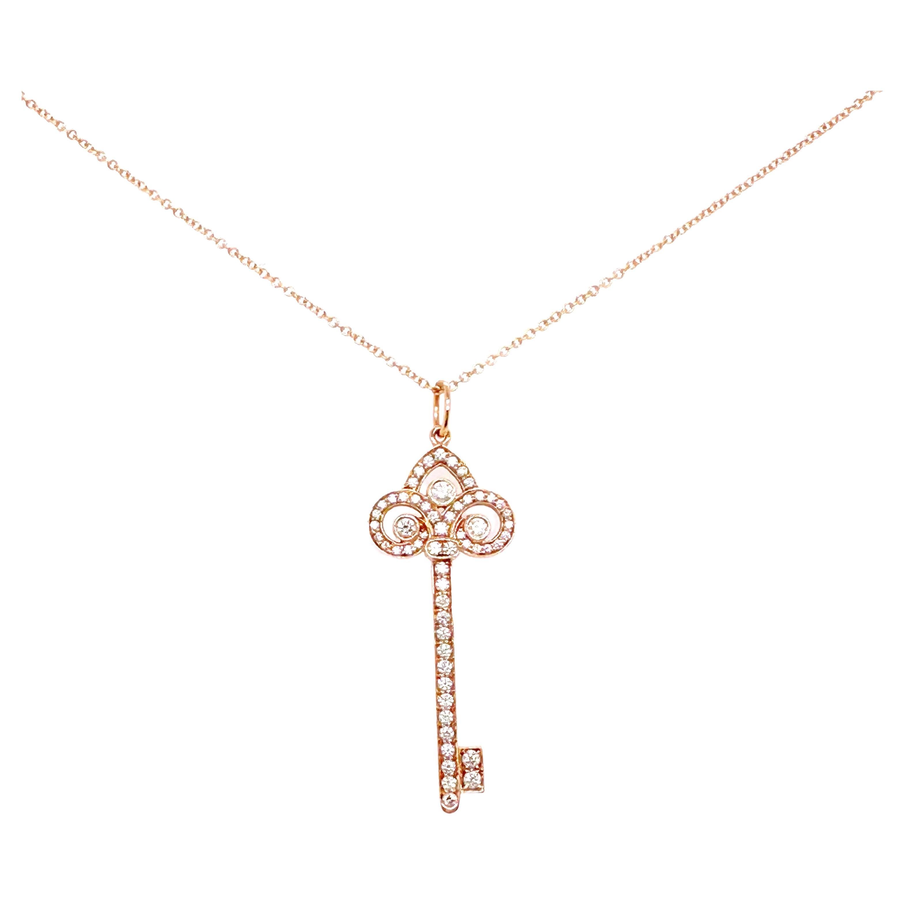 Tiffany & Co Fleur De Lis Diamond Key Pendant in 18 Karat Rose Gold For Sale