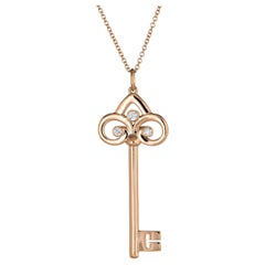 Tiffany & Co. Fleur de Lis Diamond Key Pendant Necklace 18 Karat Gold Estate