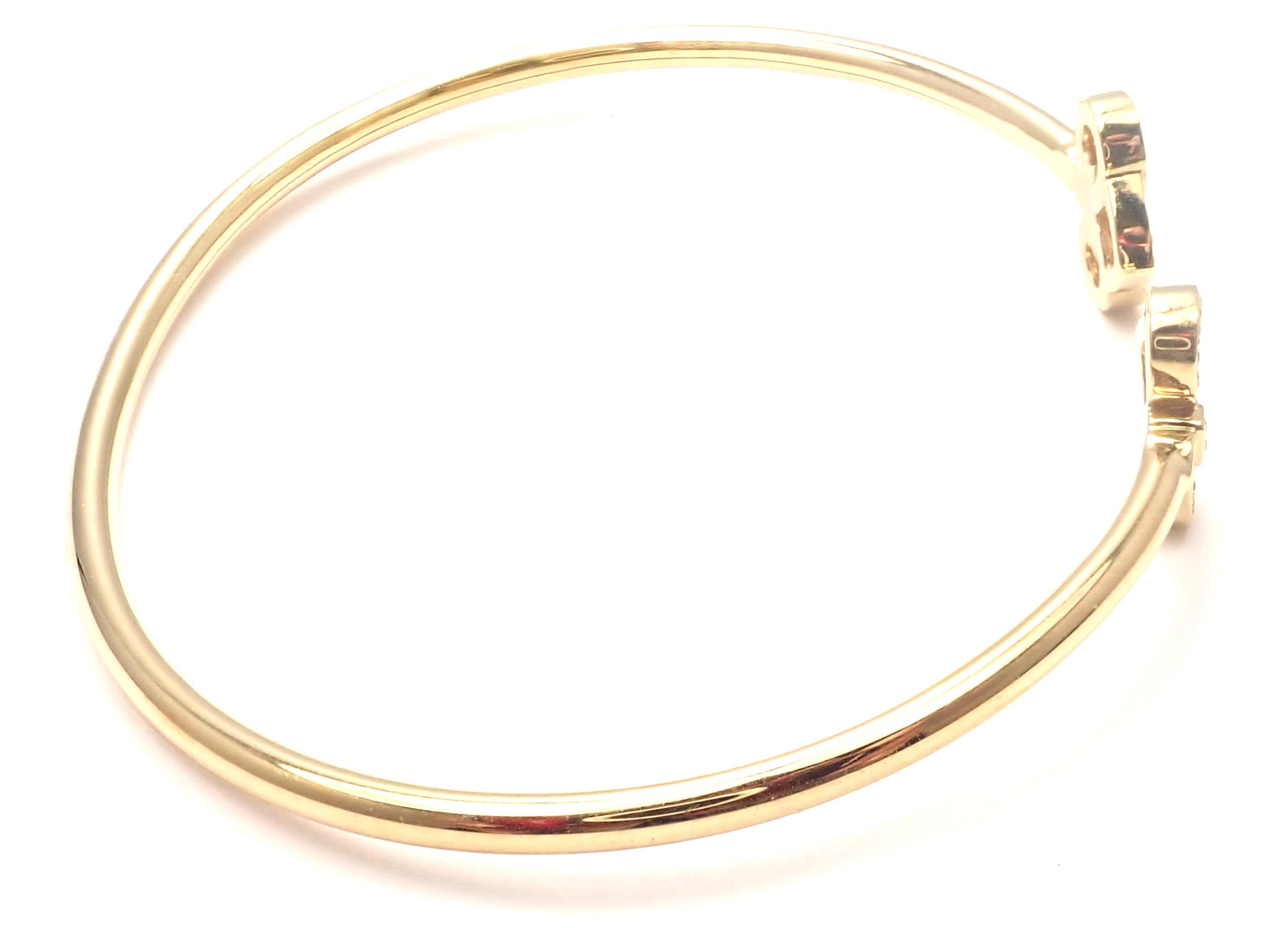 18k Rose Gold Diamond Fleur de Lis Bangle Bracelet von Tiffany & Co. 
Mit runden Diamanten im Brillantschliff VS1 Klarheit:: E Farbe Gesamtgewicht ca. .12ct
Details: 
Länge: 6.25