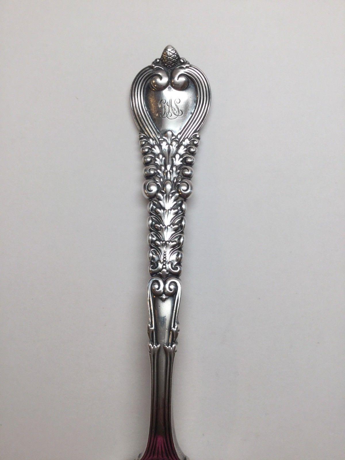 Tiffany & Co. sterling silver crumber in the 1900 Florentine pattern. 
No monogram. 
Marked: TIFFANY & CO. STERLING PAT 1900. 
Measures: 12 7/8