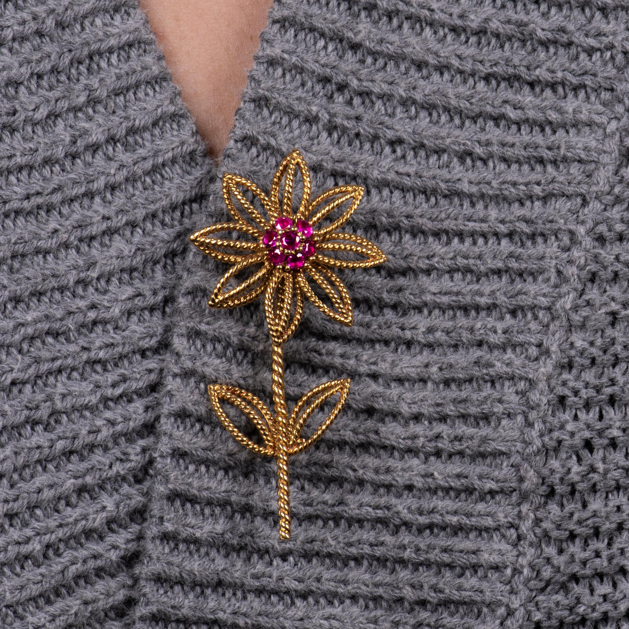 Vintage Tiffany & Co ruby flower brooch in 18K yellow gold with approximately 0.06 carats in fine rubies. 
