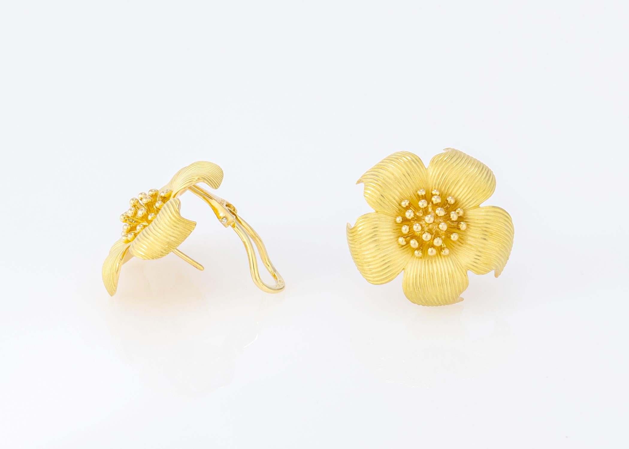Tiffany & Co. has created wearable art since 1837. Mother Nature has been creating beauty since the beginning of time. Flowers have the power to slow us down and make us smile. This pair of five petal Tiffany earrings has amazing detailing and is