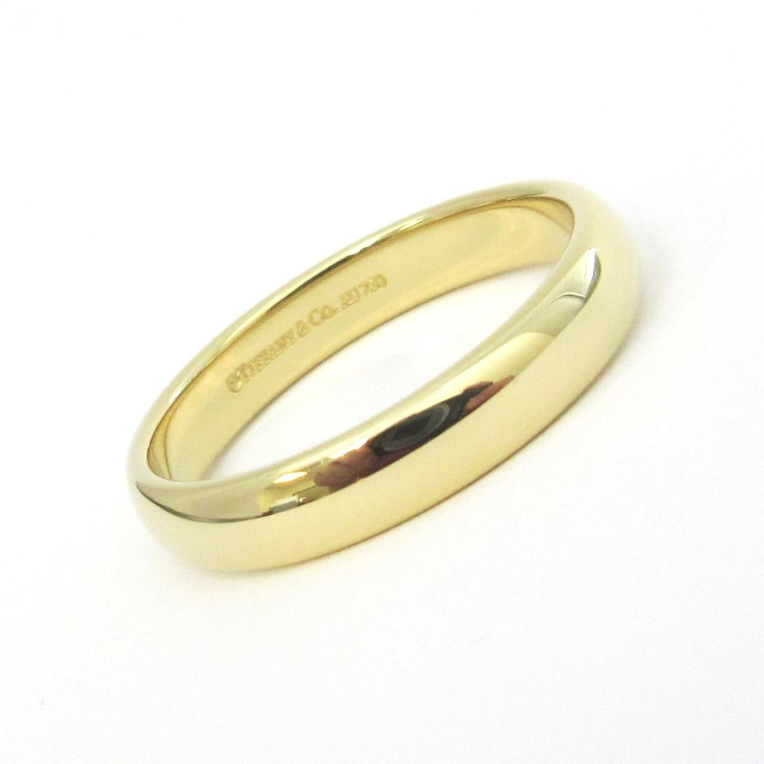 TIFFANY & Co. Forever Or 18K 4.5mm Lucida Wedding Band Ring 12 

Métal : Or jaune 18K
Taille : 12 
Largeur de la bande : 4,5 mm
Poids : 7.70 grammes
Poinçon : ©TIFFANY&Co. AU750
Condit : Excellent état, comme neuf.
Prix Tiffany : 1 500

Authenticité