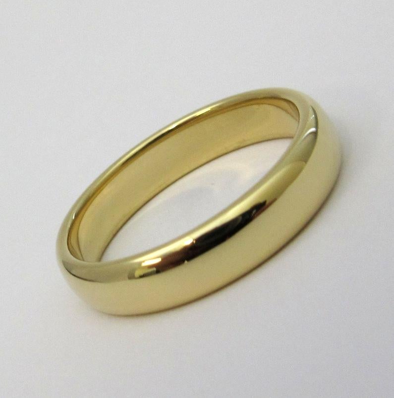 TIFFANY & Co. Forever 18K Gold 4.5mm Lucida Wedding Band Ring 8

Metal: 18K Gold
Size: 8 
Band Width: 4.5mm
Weight: 6.80 grams
Hallmark: ©1999 TIFFANY&CO. 750
Condition: Excellent condition, like new
Value: $1,500

Authenticity Guaranteed