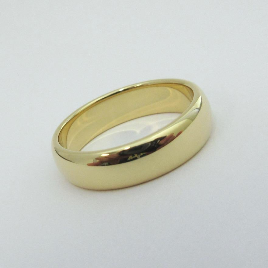 TIFFANY & Co. Forever 18K Gold 6mm Lucida Wedding Band Ring 10.5 

Metal: 18K Yellow Gold
Size: 10.5 
Band Width: 6mm
Weight: 9.90 grams
Hallmark: ©TIFFANY&CO. AU750
Condition: New, comes with Tiffany box
Tiffany price: $2,100

Authenticity