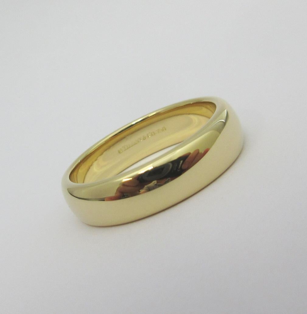 TIFFANY & Co. Forever 18K Gold 6mm Lucida Wedding Band Ring 11 

Metal: 18K Yellow Gold
Size: 11 
Band Width: 6mm
Weight: 11.10 grams
Hallmark: ©TIFFANY&CO. 750
Condition: Excellent condition, like new

Authenticity Guaranteed