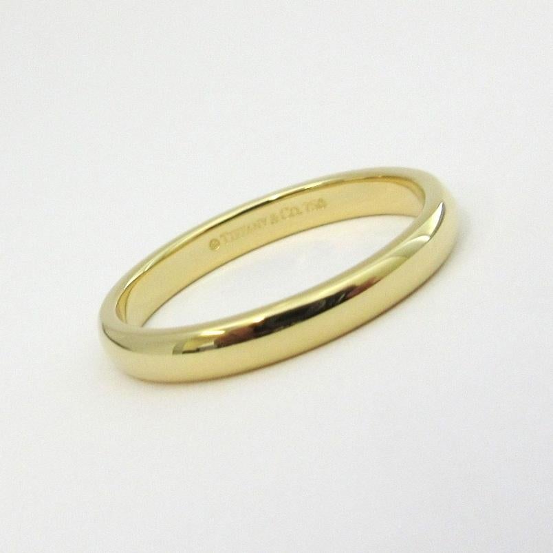 TIFFANY & Co. Forever 18K Yellow Gold 3mm Lucida Wedding Band Ring 7 

Metal: 18K Yellow Gold
Size: 7 
Band Width: 3mm
Weight: 3.50 grams
Hallmark: ©TIFFANY&CO. 750
Condition: Excellent condition, like new
Tiffany Retail Price: $980

 Authenticity