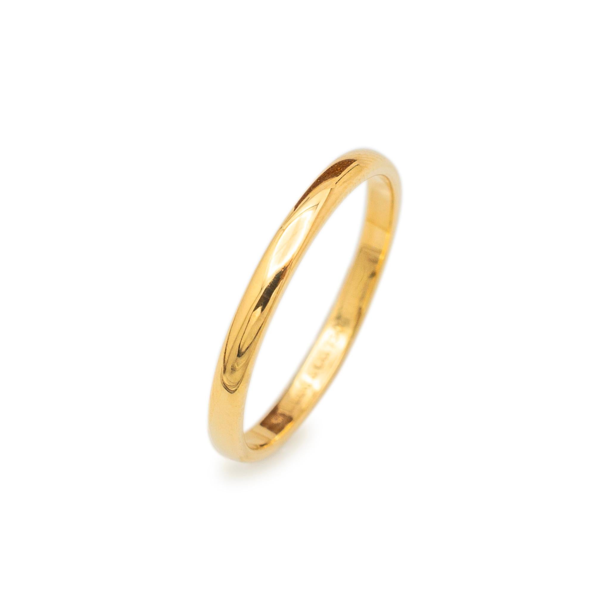 Brand: Tiffany & Co.

Gender: Ladies

Metal Type: 18K Yellow Gold

Size: 6.5

Shank Maximum Width: 2.00 mm

Weight: 1.77 grams

Ladies 18K yellow gold wedding band with a half-round shank. Engraved with 