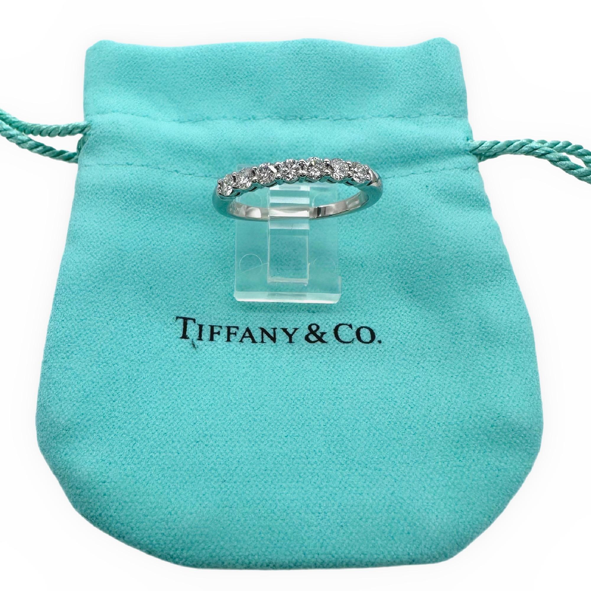 Tiffany & Co. FOREVER Half Circle Diamond Band Ring
Style:   Half-circle Band
Metal:  Platinum PT950
Size:  9 sizable
Measurements:  3 MM
TCW:  0.57 tcw
Diamond:  7 Round Brilliant Diamonds
Hallmark:  ©TIFFANY&CO. PT50
Includes:  T&C Jewelry