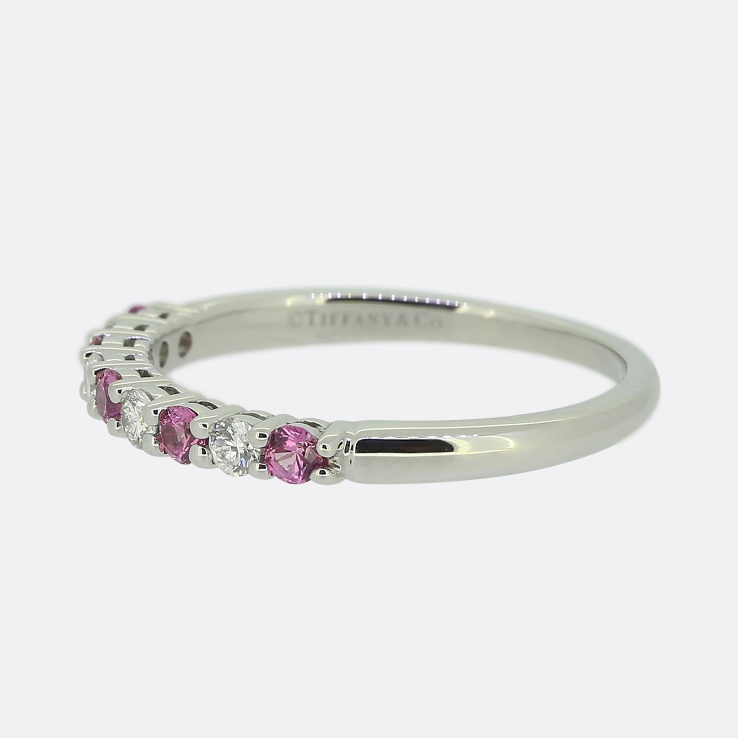 Here we have a wonderful ring from the world renowned jewellery designer, Tiffany & Co. This piece has been crafted from platinum and features an alternate pattern of pink sapphire and then diamonds.
This ring forms part of the forever collection