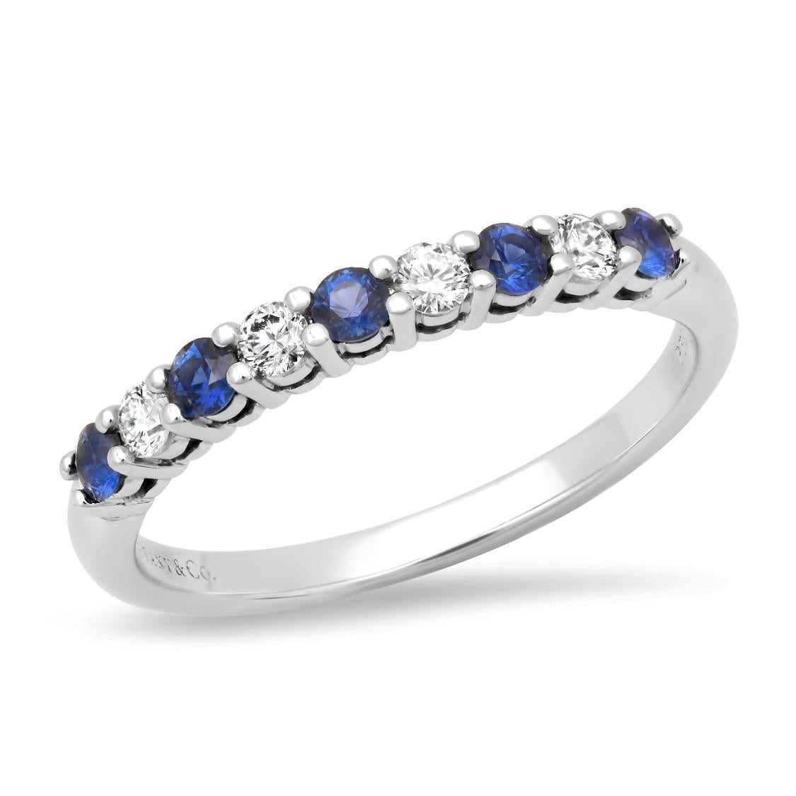 TIFFANY & Co. Forever Platinum 2.2mm Half Circle Diamond Sapphire Embrace Band Ring 5.5

Metal: Platinum
Size: 5.5
Band Width: 2.2mm
Diamond: 4 round brilliant diamonds, carat total weight .12
Sapphire: 5 round blue sapphires, carat total weight .17