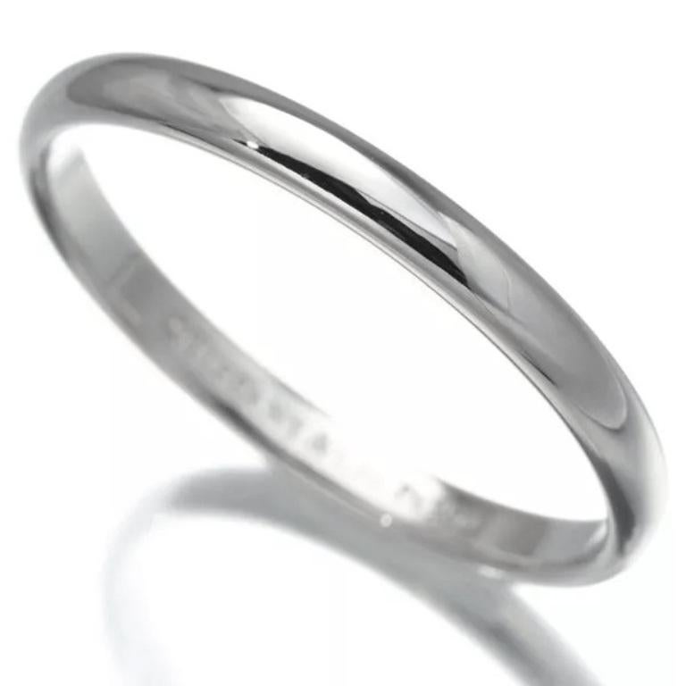 TIFFANY & Co. Forever Platinum 2mm Lucida Wedding Band Ring 7

Metal: Platinum
Size: 7
Band Width: 2mm
Hallmark: ©TIFFANY & CO. Pt950
Condition: Excellent condition, like new 
Tiffany Price: $950

Authenticity Guaranteed