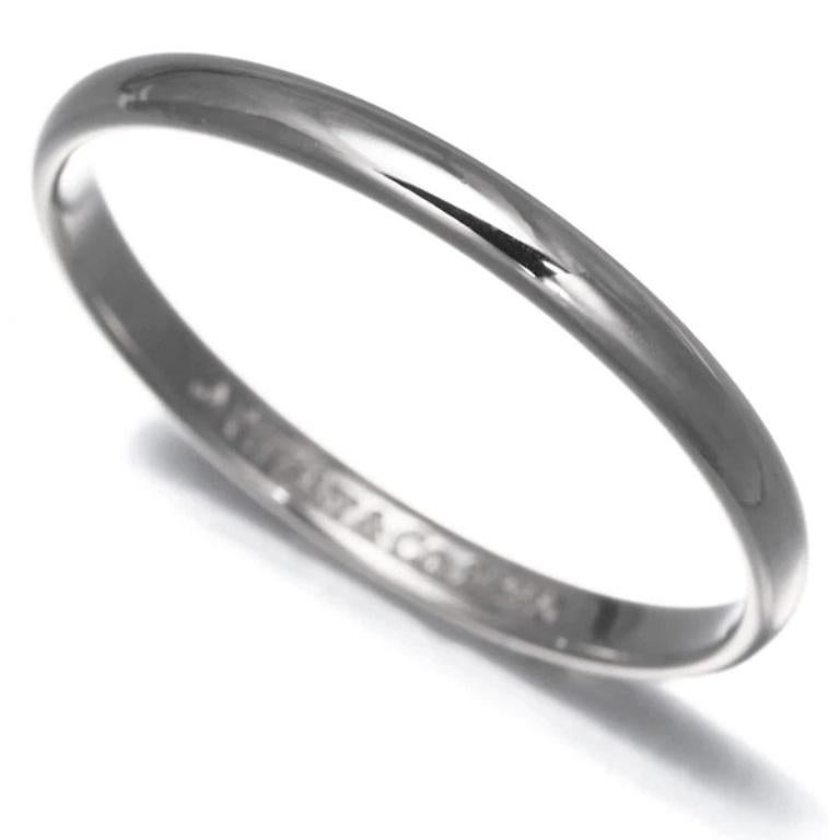 TIFFANY & Co. Forever Platinum 2mm Lucida Wedding Band Ring 9

Metal: Platinum
Size: 9
Band Width: 2mm
Hallmark: ©TIFFANY & CO. Pt950
Condition: Excellent condition, like new 
Tiffany Price: $950

Authenticity Guaranteed