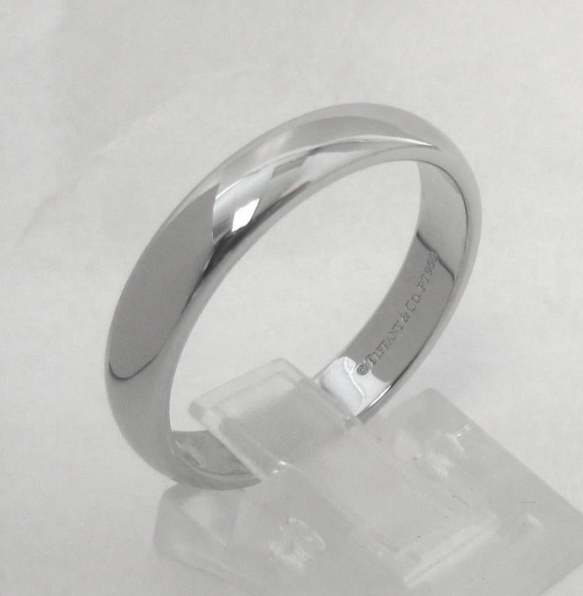TIFFANY & Co. Forever Platinum 4.5mm Lucida Wedding Band Ring 12 Men's

Metal: Platinum
Size: 12
Band Width: 4.5mm
Weight: 10.30 grams
Hallmark: ©TIFFANY&CO. PT950
Condition: Excellent condition, like new
Tiffany price: $2,500

Authenticity