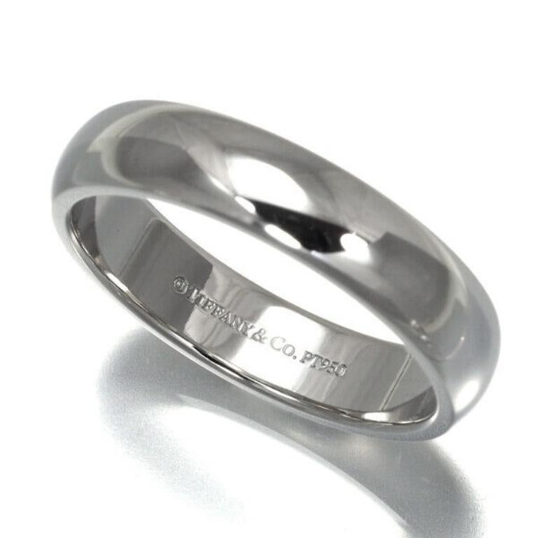 TIFFANY & Co. Forever Platinum 4.5mm Lucida Wedding Band Ring 7

 Metal: Platinum
 Size: 7
 Band Width: 4.5mm
 Hallmark: ©TIFFANY&CO. PT950
 Condition: Excellent condition, like new
 Tiffany Price: $2,200

 Authenticity Guaranteed