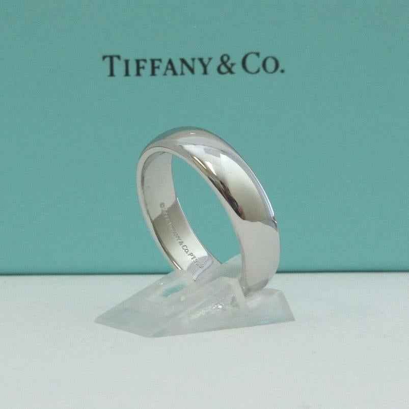 TIFFANY & Co. Forever Platinum 6mm Lucida Wedding Band Ring 11

Metal: Platinum
Size: 11
Band Width: 6mm
Weight: 15.20 grams
Hallmark: ©1999 TIFFANY&Co. PT950 
Tiffany price: $3,050

Authenticity guaranteed
