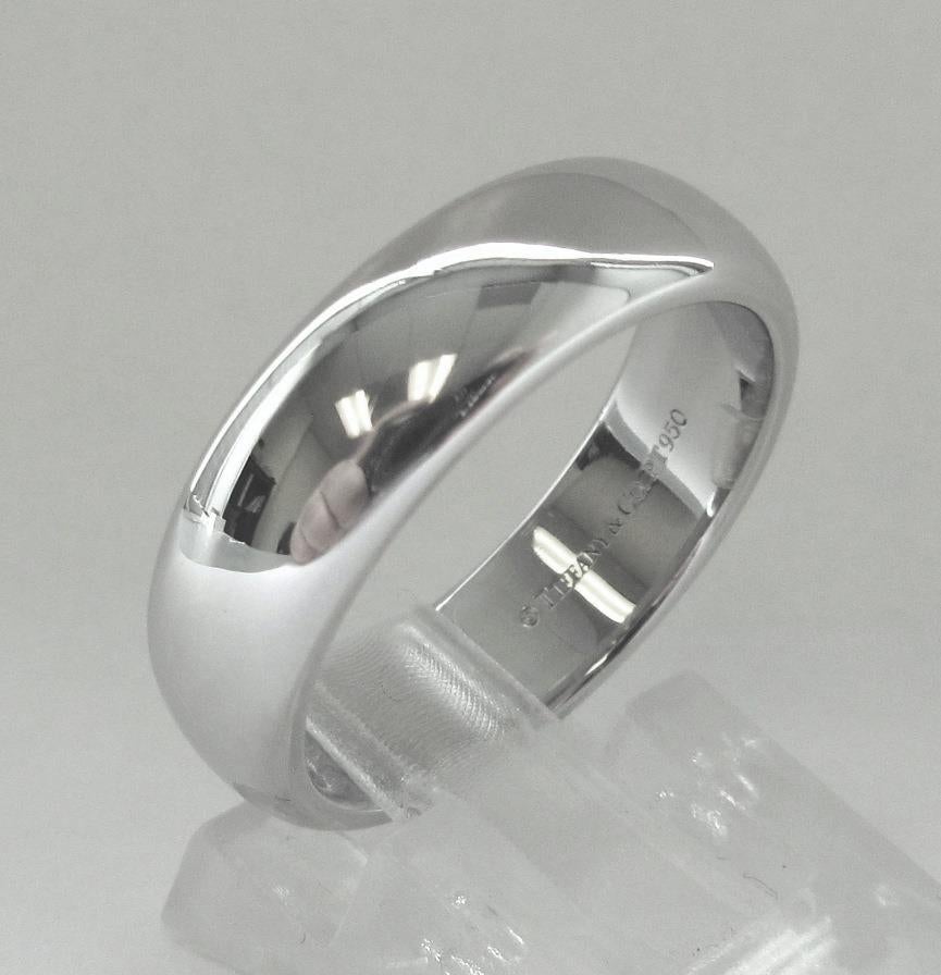 TIFFANY & Co. Forever Platinum 6mm Lucida Wedding Band Ring 8

Metal: Platinum
Size: 8
Band Width: 6mm
Hallmark: ©TIFFANY&CO. PT950
Condition: Excellent condition, like new 
Tiffany Price: $2,900

Authenticity Guaranteed
