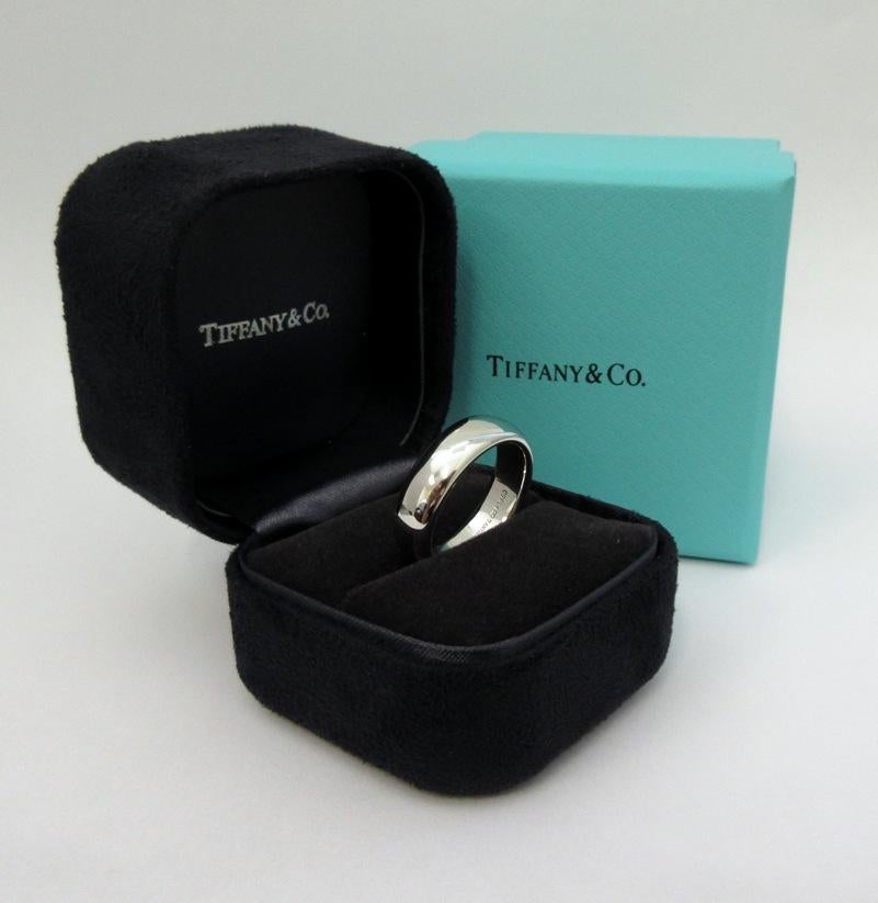 TIFFANY & Co. Forever Platinum 6mm Lucida Wedding Band Ring 8

Metal: Platinum
Size: 8
Band Width: 6mm
Weight: 14.40 grams
Hallmark: ©1999 TIFFANY&CO. PT950
Condition: Brand new, never worn. It comes with Tiffany box 
Tiffany Price: