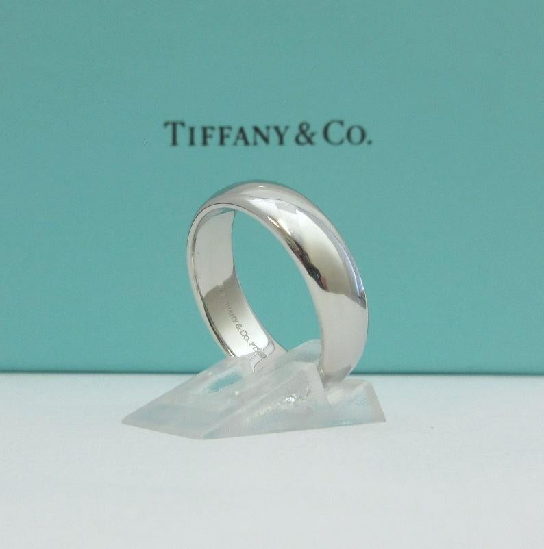 TIFFANY & Co. Forever Platinum 6mm Lucida Wedding Band Ring 9.5

Metal: Platinum
Size: 9.5
Band Width: 6mm
Weight: 12.60 grams
Hallmark: ©TIFFANY&Co. PT950
Condition: Excellent condition, like new, comes with Tiffany box 
Tiffany price: