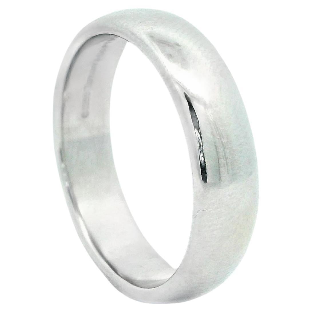 Tiffany & Co Forever wedding band in platinum offered by Alex & Co. This classic and refined ring is 6mm wide with a finger size of 11.5. Each Tiffany Forever ring celebrates the eternal bond of lifelong love and commitment. This ring is