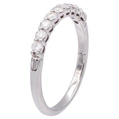 Tiffany
Co. Forever Platinum 9-Stone Half Circle Round Diamond Band Ring (bague en platine à 9 pierres avec diamant rond)